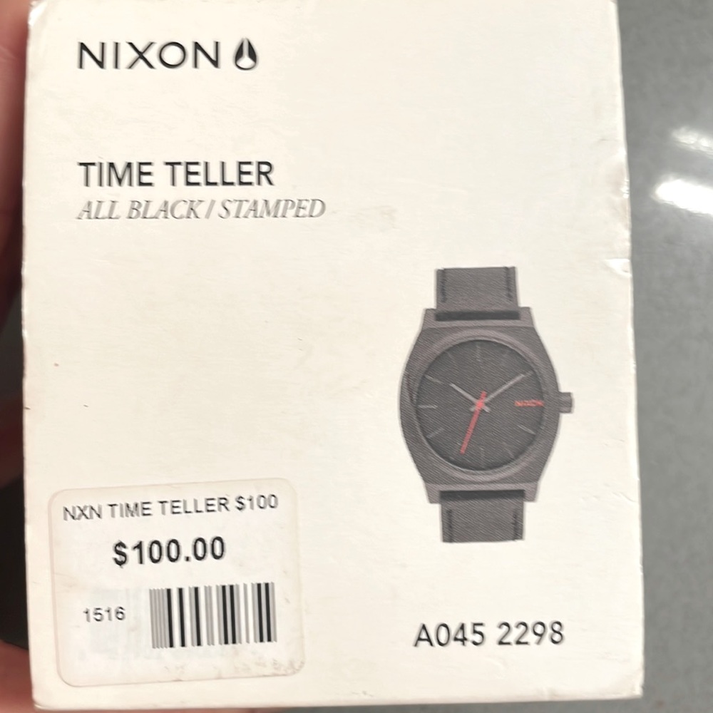 Black unisex Nixon timeteller watch